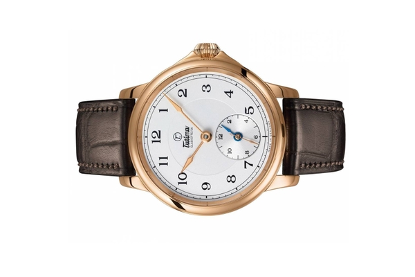 Đồng hồ đeo tay thương hiệu Tutima, dòng sản phẩm Patria, Ref no: 6601-01, mặt số mạ bạc, size 43mm, máy lên cót tay, vỏ và khóa đồng hồ bằng vàng hồng 18k, dây đeo da cá sấu, hàng mới 100%