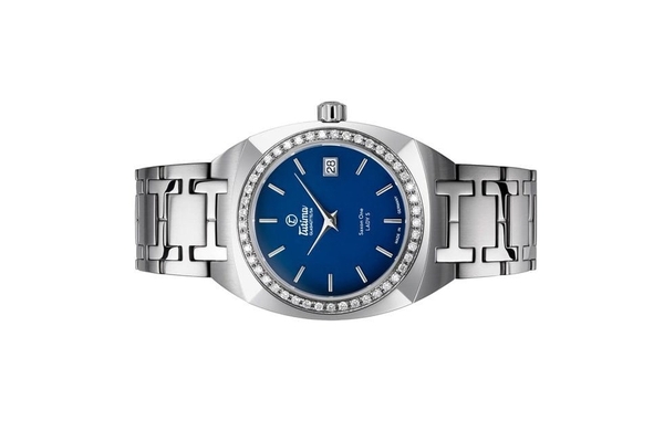 Đồng hồ đeo tay thương hiệu Tutima, dòng sản phẩm Saxon One Lady S, Ref no: 6703-03, mặt số xanh dương, size 34mm, máy pin, vỏ và dây đồng hồ bằng thép không gỉ, hàng mới 100%