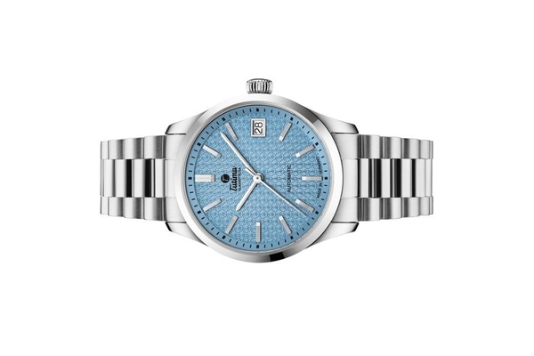 Đồng hồ đeo tay thương hiệu Tutima, dòng sản phẩm Lady Sky, Ref no: 6705-06, mặt số xanh băng, size 34mm, máy tự động, vỏ và dây đồng hồ bằng thép không gỉ, hàng mới 100%