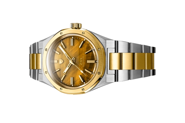 Đồng hồ đeo tay thương hiệu Nivada Grenchen, dòng sản phẩm F77, Ref number: 68033A77, mặt số Tiger Eye Bicolor Mark I, size 37mm, máy tự động, vỏ và dây đồng hồ bằng thép 316L, mới 100%