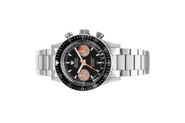 Đồng hồ đeo tay thương hiệu Nivada Grenchen, dòng sản phẩm Chronomaster White Orange Boy, Ref number: 86012WM, mặt số đen, size 38mm, lên dây cót bằng tay, vỏ và dây đồng hồ bằng thép không gỉ, mới 100%