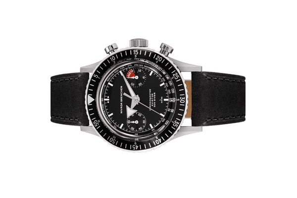 Đồng hồ đeo tay thương hiệu Nivada Grenchen, dòng sản phẩm Chronomaster White Broad Arrow, Ref no: 86007WM, mặt số màu đen, size 38mm, lên dây cót bằng tay, vỏ đồng hồ bằng thép không gỉ và dây da bò, mới 100%