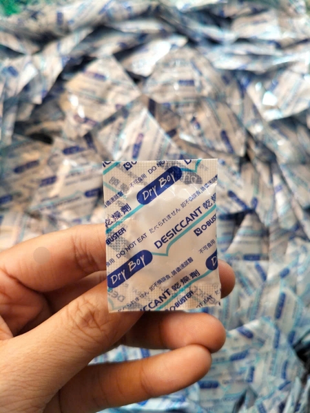 1GX50 - Túi hút ẩm O-BUSTER Xanh NHỎ 1G - Gói lẻ 47-50c
