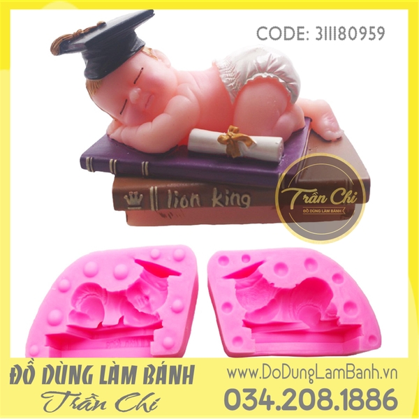 Khuôn silicone Baby cử nhân nằm trên sách
