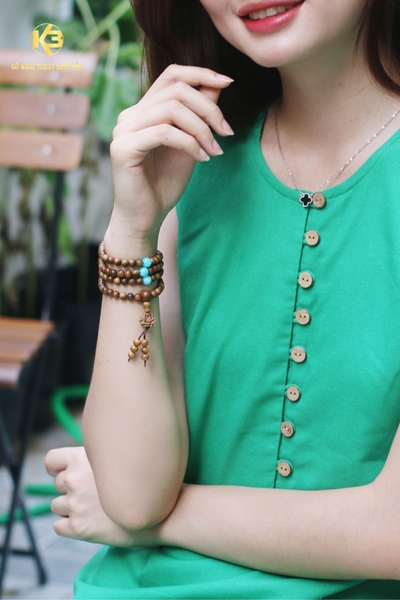 vong-tram-huong-108-hat-tron-pho-i-charm-hoa-sen-tra-m