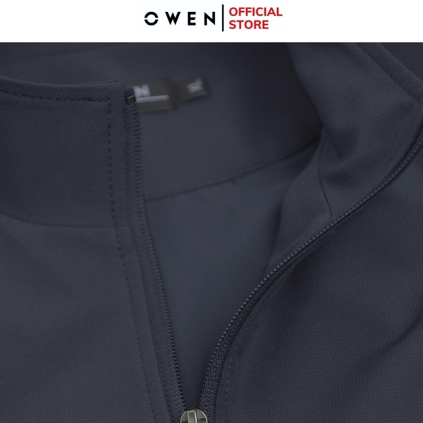 Bộ mặc nhà OWEN BMN241335 màu xanh đậm dáng reguler, áo cổ 3 phân, khóa kéo, tay và gấu bo chun, quần cạp chun ống suông chất liệu CVC spandex