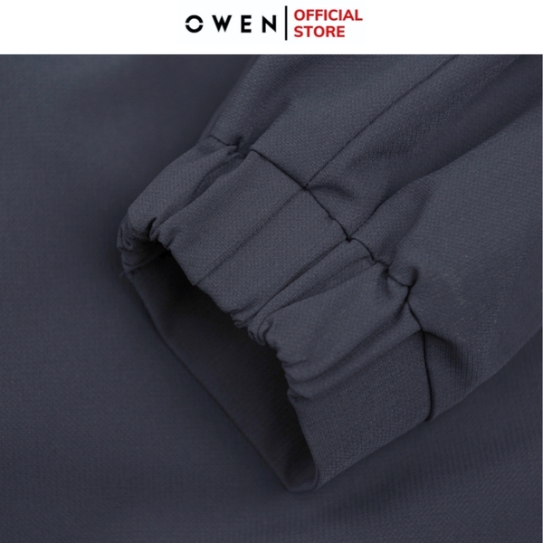 Bộ mặc nhà OWEN BMN241338 màu xanh than đậm dáng reguler, áo cổ 3 phân, khóa kéo, tay và gấu bo chun, quần cạp chun ống suông chất liệu CVC spandex