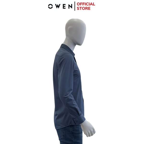 Áo Sơ Mi Nam Tay Dài Owen AR240610D màu xanh đậm trơn dáng suông regular fit tà lượn không túi chất liệu polyester