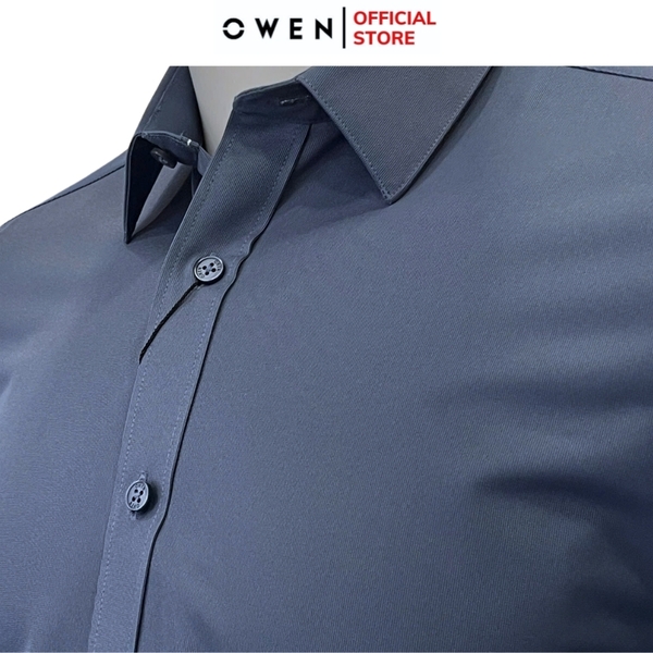 Áo Sơ Mi Nam Tay Dài Owen AR240610D màu xanh đậm trơn dáng suông regular fit tà lượn không túi chất liệu polyester