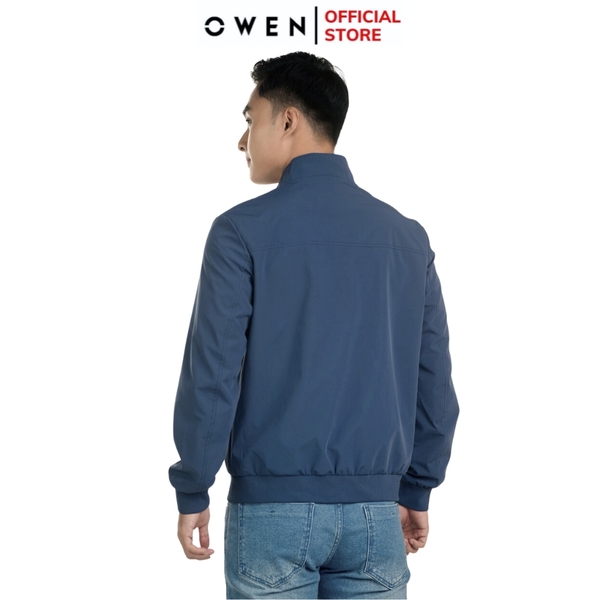 Áo Khoác Jacket Owen JK241476 màu xanh đậm dáng regular fit, cổ cao 3 phân, khóa kéo, tay và gấu bo chun chất liệu polyester