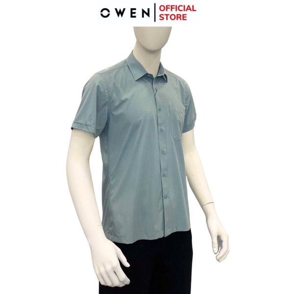 Áo Sơ Mi Nam Tay Ngắn Owen AB250020NT màu xanh đậm dáng suông body fit tà bằng có túi chất liệu bamboo poly