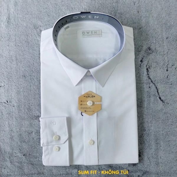 Áo Sơ Mi Trắng Nam Tay Dài Owen AS240314D màu trắng ngà trơn dáng ôm slim fit tà lượn không túi chất liệu Modal Poly