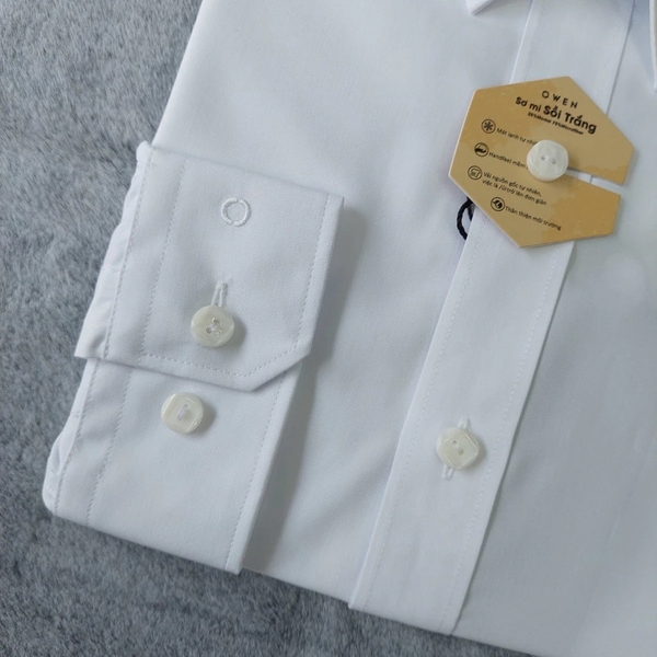 Áo Sơ Mi Trắng Nam Tay Dài Owen AS240314D màu trắng ngà trơn dáng ôm slim fit tà lượn không túi chất liệu Modal Poly