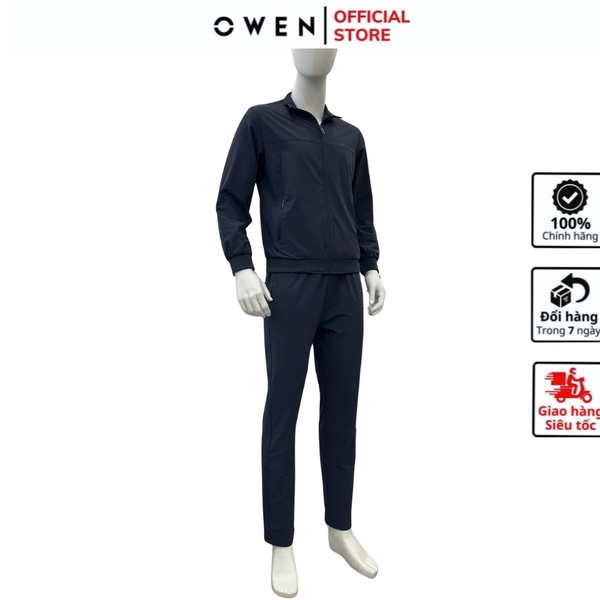 Bộ Thể Thao Nam Owen BTT256157 màu xanh tím than dáng reguler, áo cổ 3 phân, khóa kéo, tay và gấu bo chun, quần cạp chun ống suông chất liệu polyester