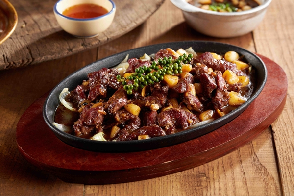 Bò cháy tỏi bản gang tiêu xanh