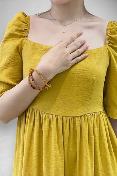 Đầm maxi cổ vuông tay ngắn 4 tầng bèo - vàng