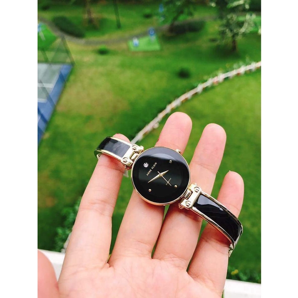 (アン・クライン) Anne Klein AK/1980BKGB バングル腕時計 女性用 ダイヤモンド付き文字盤 ブラックとゴールド調 アン・クライン) Anne Klein AK⁄1980BKGB バングル腕時計 女性用