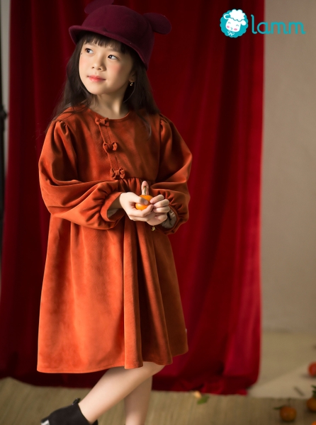 Váy nhung vạt lệch nơ ngực màu cam