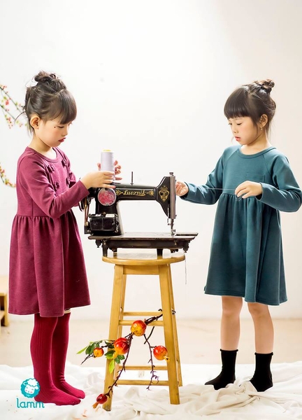 Váy thun raglan túi ngực xanh lục