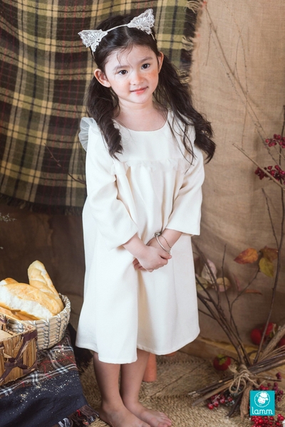 Váy dạ tweed bèo voan màu trắng	SNOWY