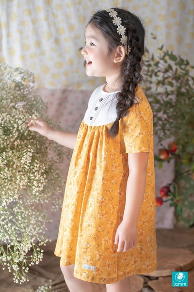 Váy thô Hàn yếm ngực 3 khuy hoa vàng MARIGOLD