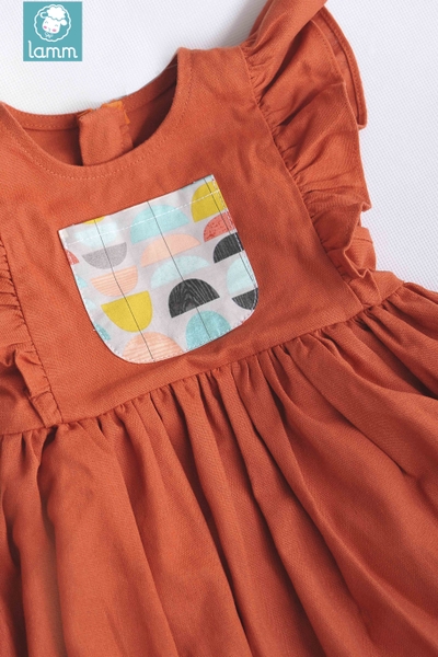 Váy linen cam phối hoạ tiết ô đại