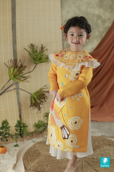 Áo dài gấm vàng họa tiết chim ADYEMVANG