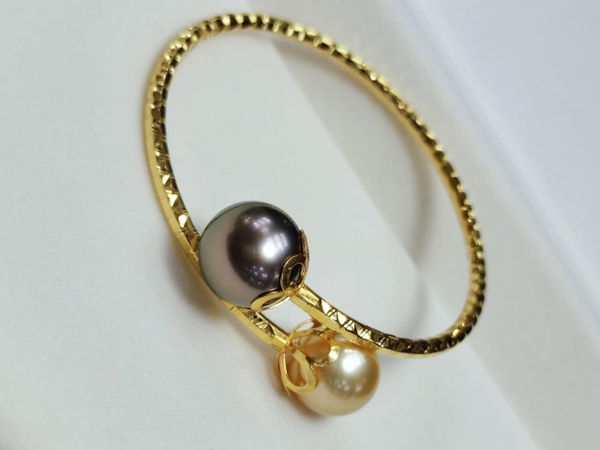 KIỀNG TAY DIOR BIỂN QUÝ PHÁI