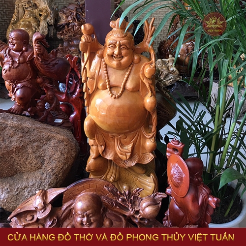 Tượng di lạc gánh đào