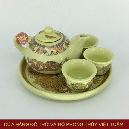 Bộ ấm trà 3 chén song long chầu nguyệt men kem vàng