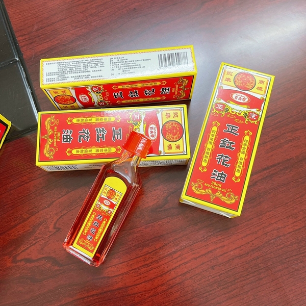 dau-xoa-bop-red-flower-oil-wing-long