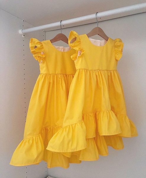 Váy bé gái mùa hè thiết kế màu vàng