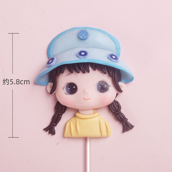 TUONG-Bé gái áo vàng tết tóc đội mũ (silicon).