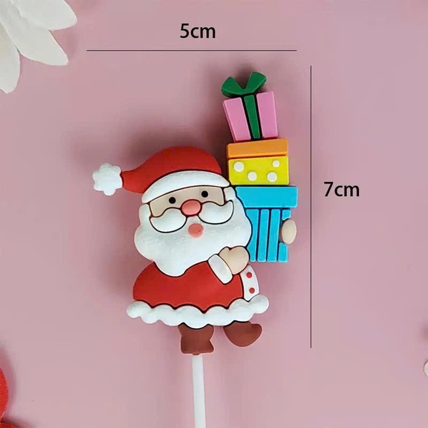Tượng nhựa dẻo-Ông già noel bê hộp quà nhiều tầng sắc màu.