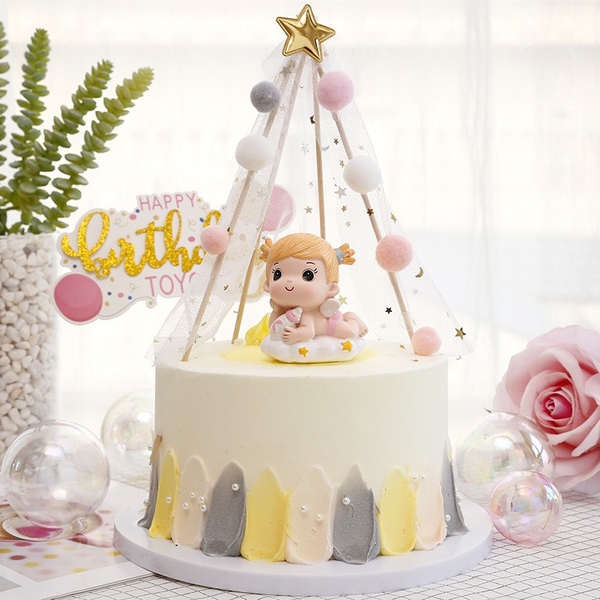 Tượng em bé nằm ôm bình sữa -BÉ GÁI (sứ).