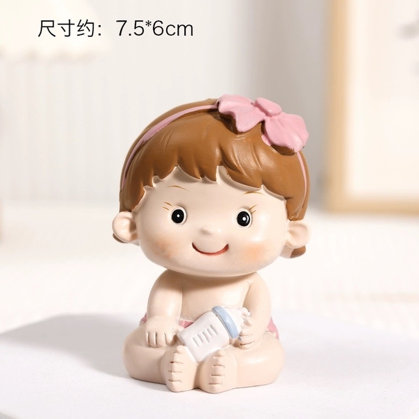 Tượng sứ -bé GÁI ôm bình sữa.