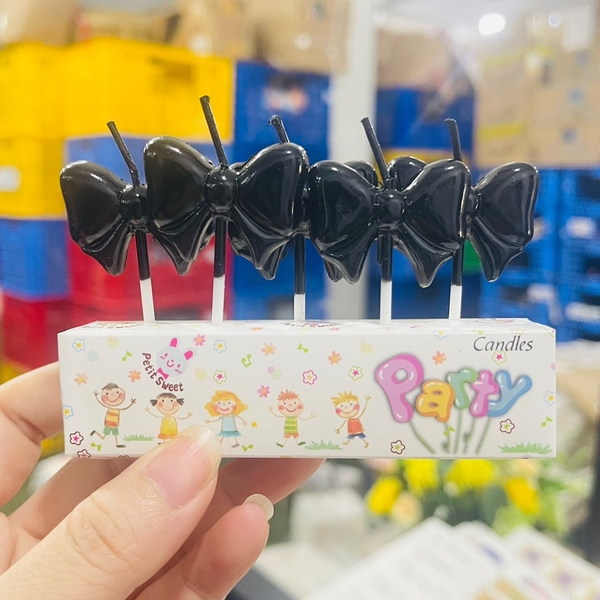 Vỉ 5 cây nến hình nơ màu ĐEN.