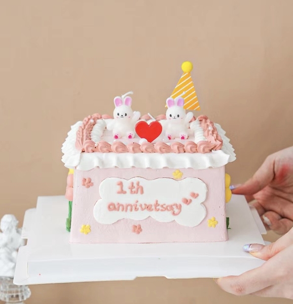 Vỉ 3 nến thỏ trắng giơ tay.