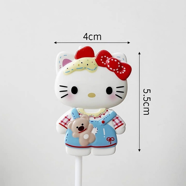 Tượng nhựa dẻo - KITTY đeo túi gấu.