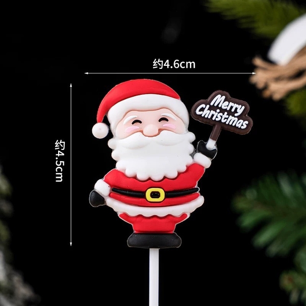 5 tượng nhựa dẻo - ông già noel cầm bảng chữ Xmas màu nâu.