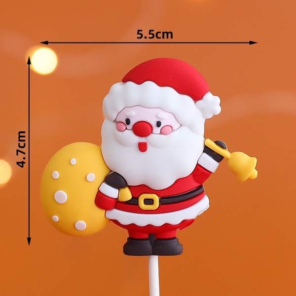 Tượng nhựa dẻo loại dày-ông già noel đeo túi quà màu vàng.