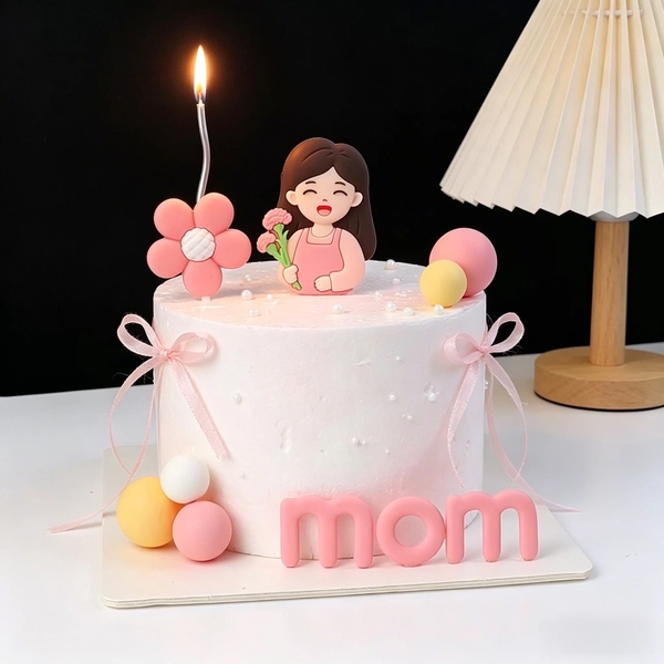 Tượng nhựa dẻo - Mẹ áo HỒNG ôm hoa màu hồng.