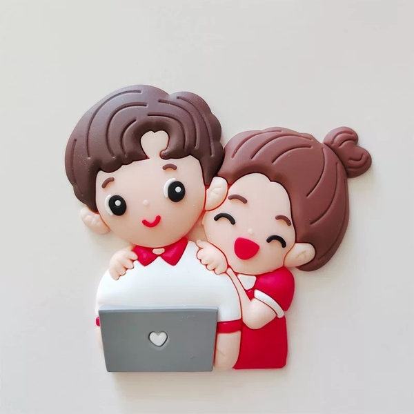 Tượng nhựa dẻo-Đôi tình yêu xem ipad.