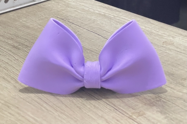 Nơ đất nặn Chiều dài 12,5cm cao 7cm-MÀU TÍM.