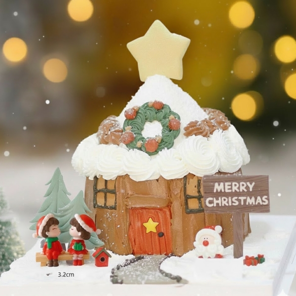 Tượng nhựa đẹp -cặp đôi em bé giáng sinh (ngồi ghế).