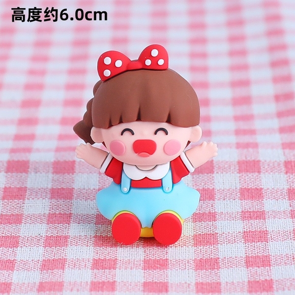 Tượng bé GÁI vui vẻ cài nơ đỏ (nhựa đẹp).