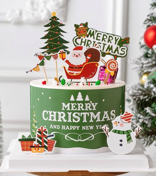 Set 10 thành bánh giấy chủ đề NOEL -màu xanh lá (ông già noel cầm hộp quà)10cmx55cm.