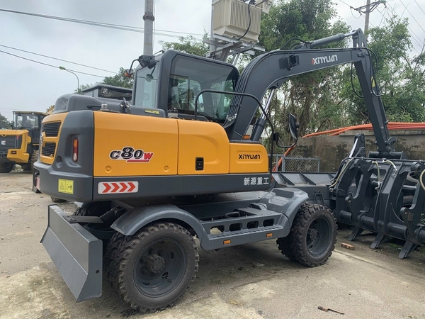 xuc-dao-banh-lop-xinuyan-xyc80wyt-gau-0-3-khoi-cty-hai-au