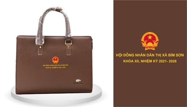 Cặp da in logo đại hội