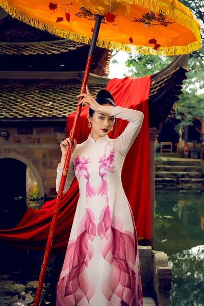 Traditional Vietnamese dress with magenta lotus pattern chiffon silk